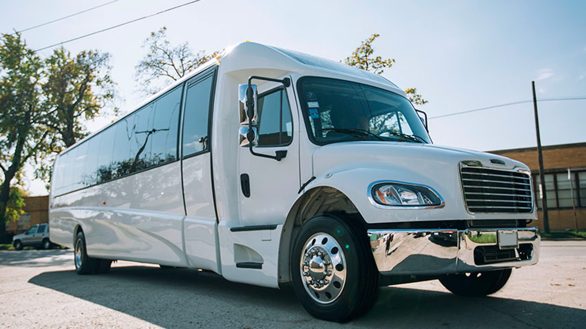 Elevate Your Miami Wedding with Our Luxurious 36-Passenger White Coach Bus